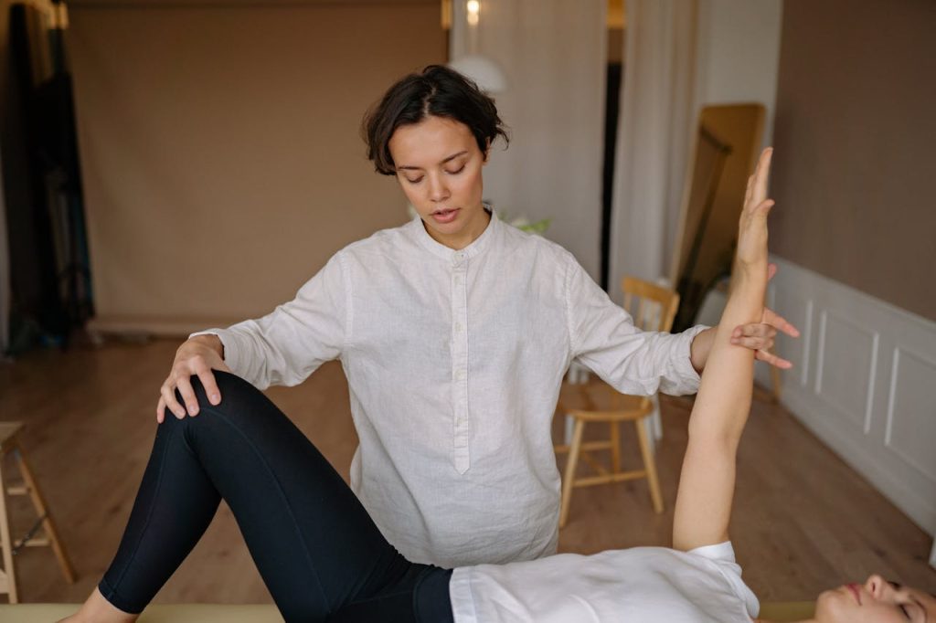 A Therapist Massaging a Patient